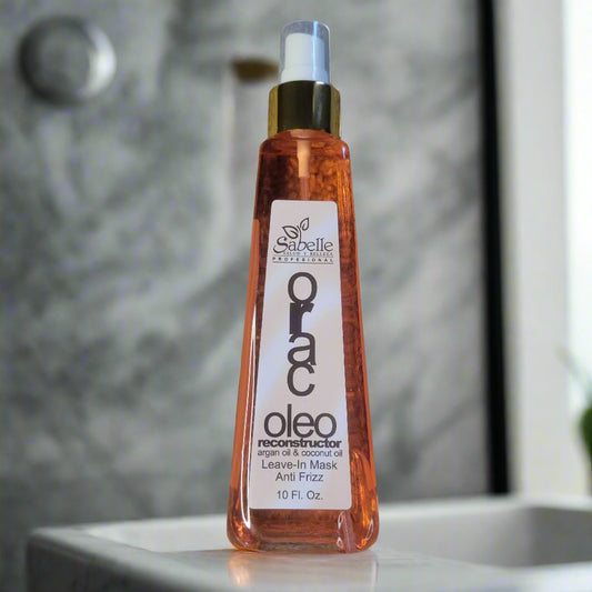 Oleo hair product bottle on a textured surface