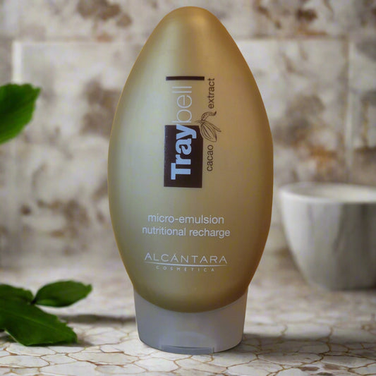 Shampoo bottle with 'Traybell' and 'Aldocantara' branding on a yellow background