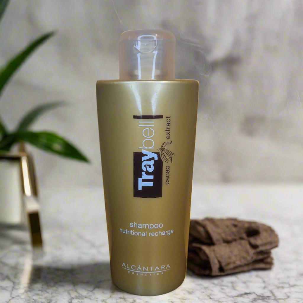 Shampoo bottle with 'Trybell' branding on a yellow background