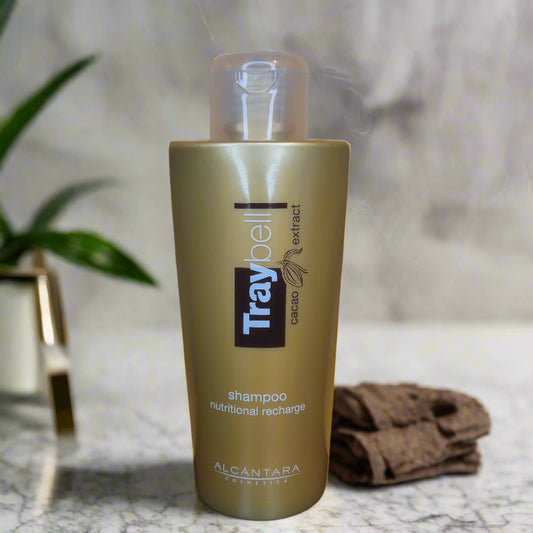 Shampoo bottle with 'Trybell' branding on a yellow background
